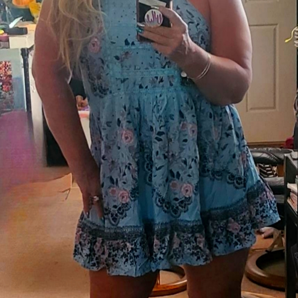 Free People sky blue mini swing dress with gorgeous floral detailing.